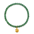 Ganesha Hindu God, Guided Transformation Jade Gemstone Bracelet featuring a delicate golden Ganesha charm, perfect for spiritual jewelry, meditation, and manifestation. Ideal for those seeking protection and meaning in their practices, this piece is a beautiful talisman for yoga enthusiasts.