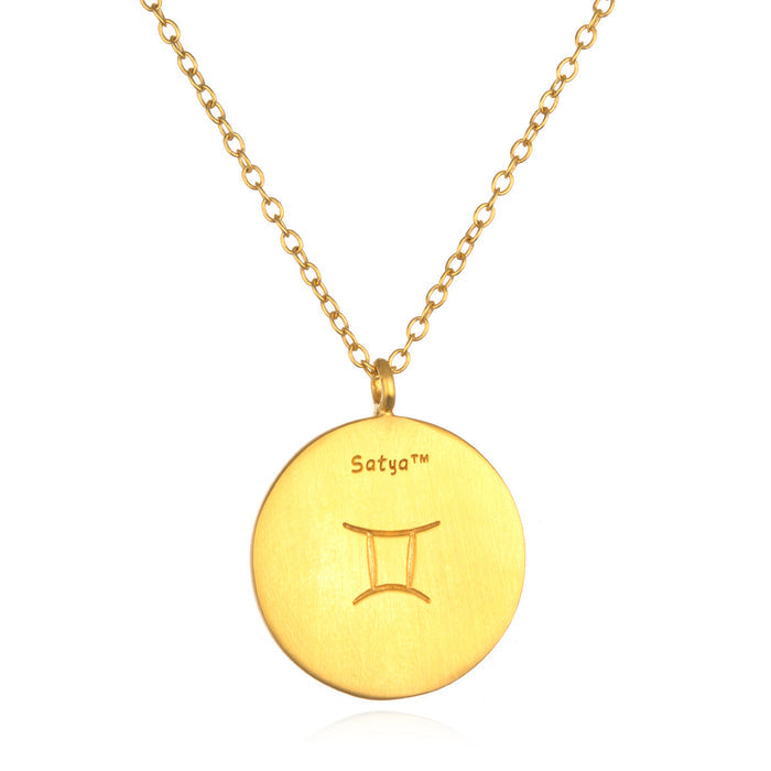A close-up of the simple yet elegant Gemini Zodiac Necklace pendant, made from quality materials; ideal for those seeking meaningful and sacred symbolism in their personal jewelry collection.