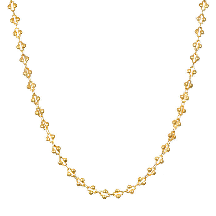 Golden Hour Coin Chain Necklace, featuring a delicate link design in 18k gold plate over brass, perfect for layering or wearing alone. This spiritual jewelry embodies the essence of the sun's golden glow, making it a meaningful talisman for meditation, protection, and manifestation.