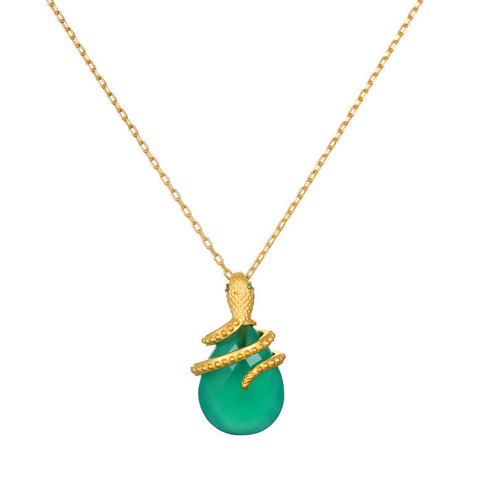 Guiding Energy Green Onyx Snake Necklace featuring a vivid green onyx stone cradled by a serpent in 18kt gold plating. This spiritual jewelry symbolizes grounding and guidance, perfect for meditation and protection rituals. Ideal for zodiac enthusiasts, this meaningful talisman enhances manifestation during yoga or other spiritual practices.