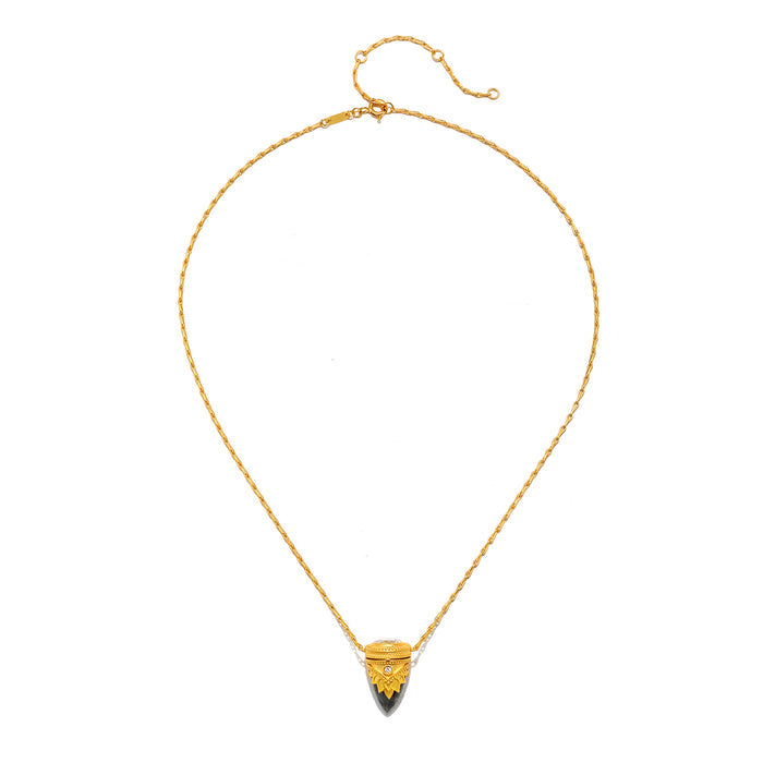 Close-up view of the Guiding Spirit Labradorite and White Topaz Lotus Locket Necklace highlighting its intricate design with a smooth dagger labradorite and golden chain, representing themes of transformation and manifestation, ideal for spiritual practices and talismans.