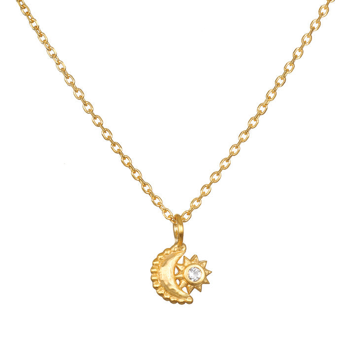 Guiding Star Celestial White Topaz Necklace showcasing an intricately designed crescent moon and star pendant, embodying spiritual jewelry for meditation and manifestation. This beautiful piece represents protection from the moon and sun, making it a meaningful talisman for yoga and zodiac practices.