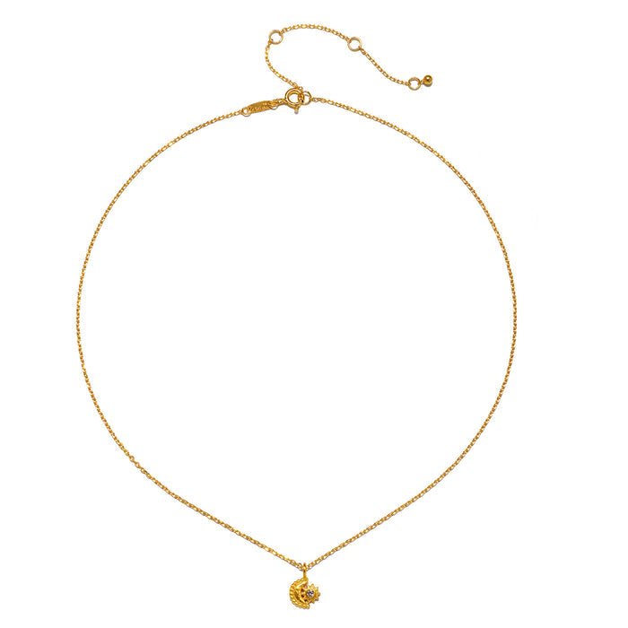 The Guiding Star Celestial White Topaz Necklace displayed flat, highlighting the crescent moon and star pendant along with the chain. This elegant spiritual jewelry serves as a talisman for meditation, protection, and manifestation, intertwining the powers of the sun and moon in a meaningful design.