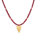 Healing Heart Red Onyx Heart Necklace featuring red onyx beads and a golden heart pendant with white topaz, representing love and protection in spiritual jewelry. Perfect for meditation, this meaningful talisman embodies the essence of manifestation, making it ideal for yoga and mindfulness practices.