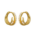 Pair of gold-tone hoop earrings with cubic zirconia stones set along the outer edge and rectangular accents.