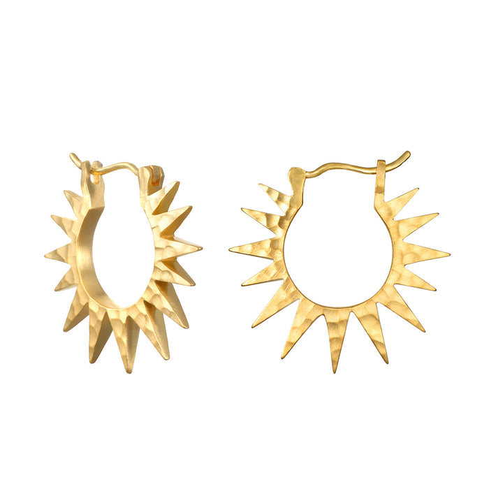 Incandescent Glow Starburst Hoop Earrings featuring a stunning open-work starburst design, symbolizing dreams and inspiration. These earrings are perfect spiritual jewelry for yoga and meditation practices, serving as a talisman for guidance and protection. Ideal for manifesting positive energy, they embody the meaning of the sun and moon in your spiritual journey.