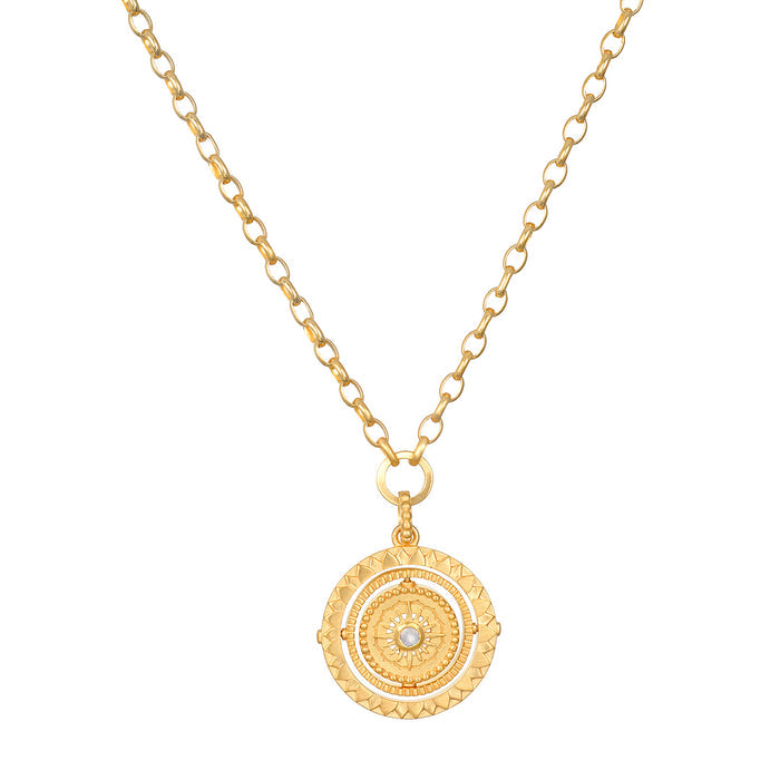 Infinite Devotion White Topaz Spinner Mandala Necklace showcased in a close-up view, emphasizing its intricate design and gold finish. This spiritual jewelry piece serves as a talisman for meditation, symbolizing protection and meaningful manifestation, connecting with the essence of the sun and moon.