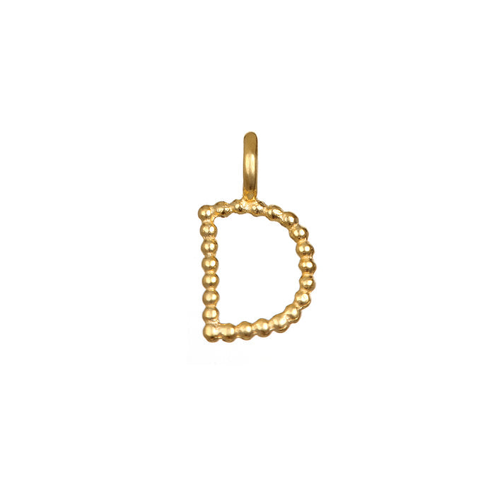 Initial Letter Charm 'D' designed to add a personal touch to your jewelry collection. This 18kt gold plated charm embodies the meaning of spiritual jewelry and is perfect for meditation, manifestation, or as a talisman for personal protection, complementing your yoga practice.