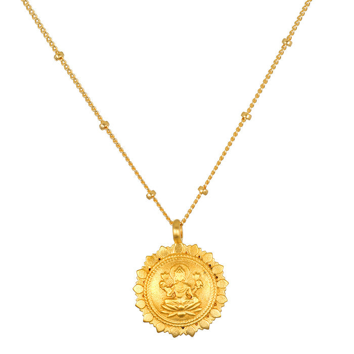 Prosperous Blessings Lakshmi Necklace features an intricate 18kt gold plated pendant depicting the goddess Lakshmi, symbolizing prosperity and abundance. This spiritual jewelry serves as a talisman for manifestation during meditation, connecting you to profound meanings in yoga and daily life.
