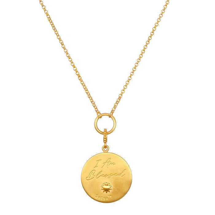Intention of Harmony Necklace Set featuring a gold pendant inscribed with 'I Am Blessed.' This spiritual jewelry symbolizes protection and positivity, perfect for meditation and yoga practices, enhancing manifestation and inner peace.