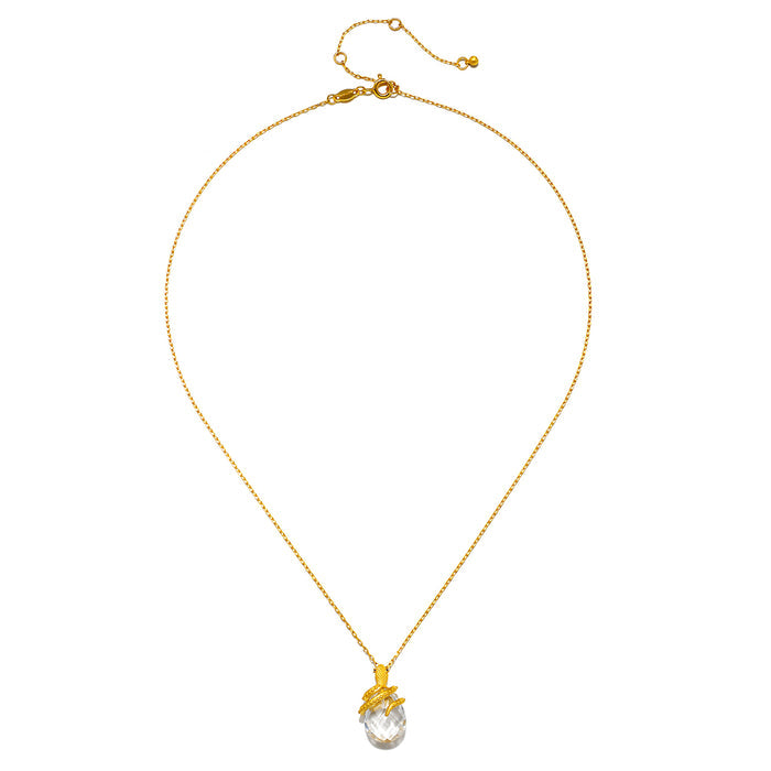 Gold-tone chain necklace with adjustable clasp and clear faceted teardrop pendant.