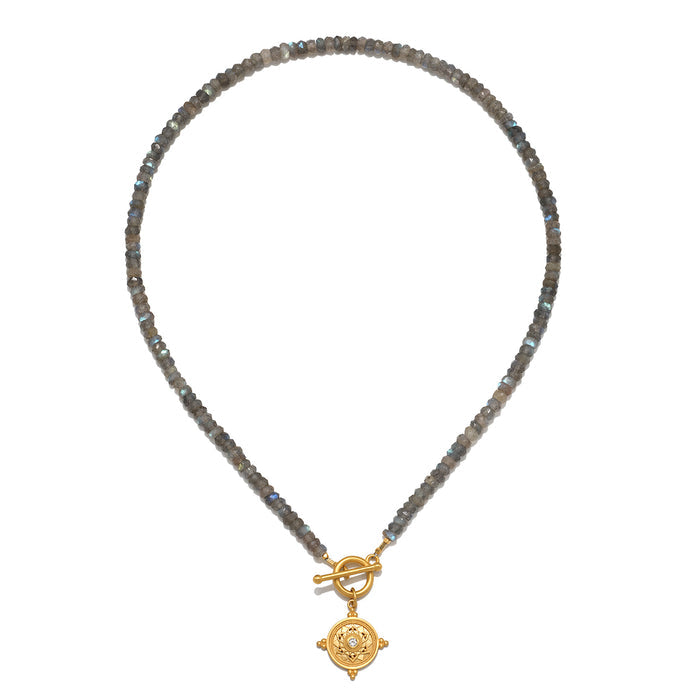 Labradorite bead necklace with gold-tone toggle clasp and circular mandala pendant.