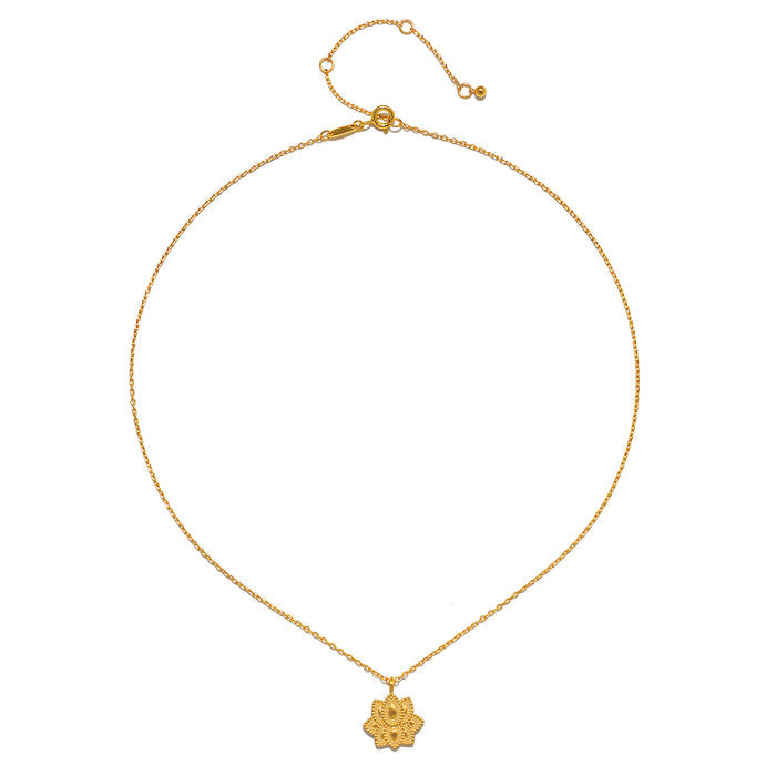 Close-up of the Journey Forward Lotus Gold Necklace emphasizing its delicate design and meaning, ideal for meditation and a charming addition to spiritual jewelry collections.