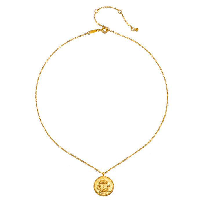 The Joyful Beginnings Necklace displayed against a soft backdrop, showcasing its stunning gold lotus pendant and adjustable chain, a meaningful addition to spiritual collections and practices like yoga and talisman energy.