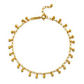 A beautiful Joyful Journey Anklet featuring delicate golden beads that create a soft, bell-like sound with every movement. This spiritual jewelry piece is perfect for meditation and serves as a meaningful talisman for manifestation. Ideal for yoga practices and embodying the energy of the sun and moon, this anklet adds a touch of elegance and protection to your spiritual journey, embodying the essence of zodiac energies.