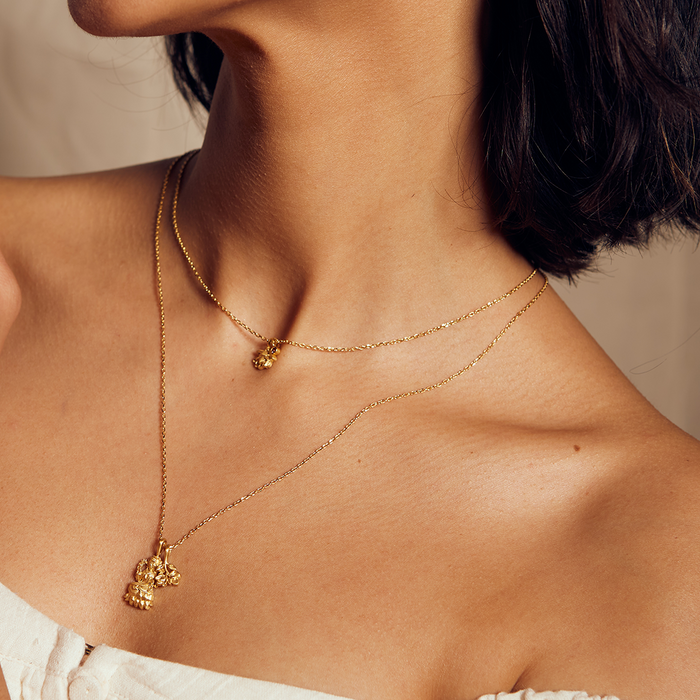 Close-up of the Lakshmi Hindu Goddess, Awaken Abundance Necklace worn elegantly, showcasing its rich symbolism for spiritual, meaningful adornment, ideal for yoga and talisman use.