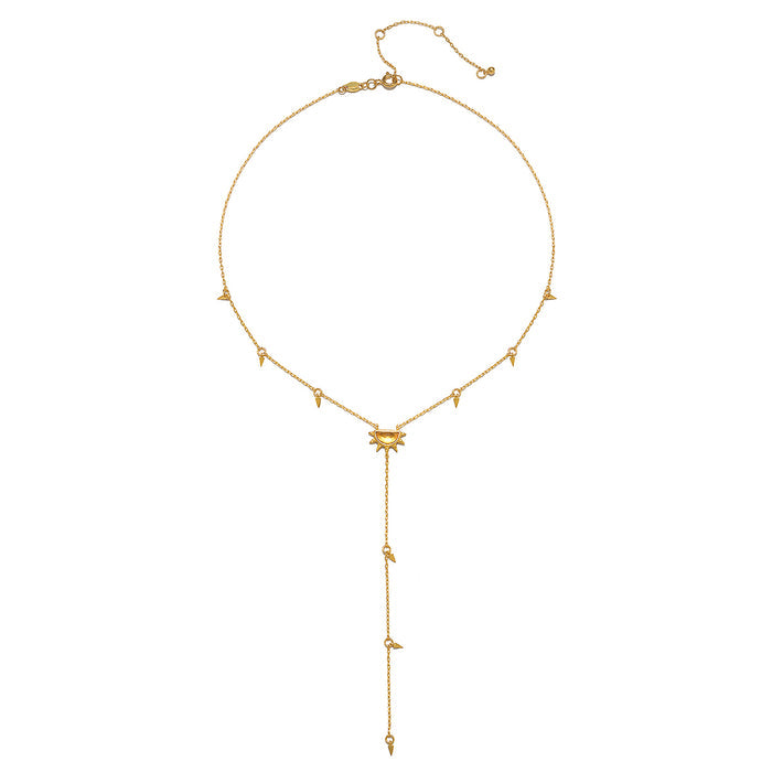 The Light of Day Gold Lariat Necklace displayed elegantly, featuring a sun-inspired pendant and delicate chain, perfect for those seeking spiritual meaning and a talisman for positivity.