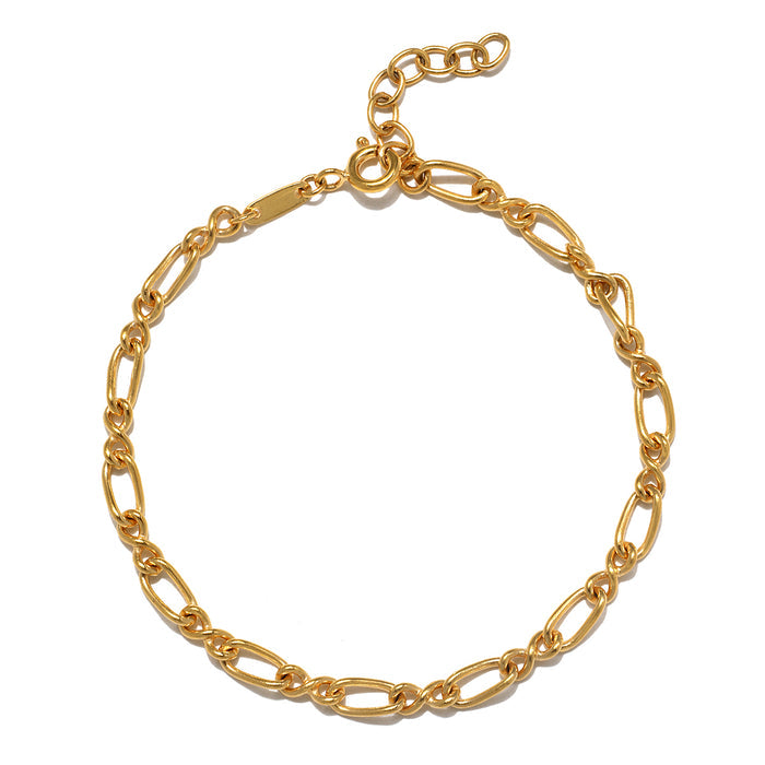 Gold-tone chain bracelet with alternating oval and round links, adjustable closure with extension chain.