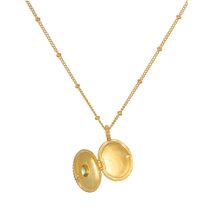 The open Lotus Aquamarine Birthstone Locket Necklace - March showcases its elegant design. This talisman represents spiritual protection and meaningful connections, ideal for those on a journey of meditation and yoga.