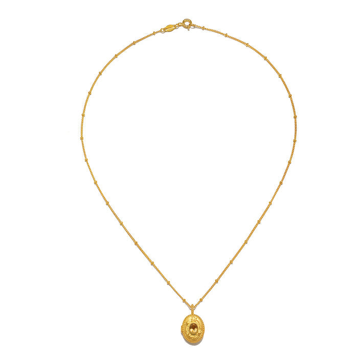 View of the Lotus Citrine Birthstone Locket Necklace - November laid flat, emphasizing its craftsmanship and the charm of its citrine stone, suitable for various spiritual and zodiac practices.