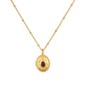 Lotus Garnet Birthstone Locket Necklace - January, featuring a sparkling red garnet set in an 18kt gold plated locket, symbolizing new beginnings and protection, perfect for meditation and manifestation as spiritual jewelry.