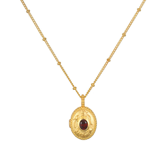 Lotus Garnet Birthstone Locket Necklace - January, featuring a sparkling red garnet set in an 18kt gold plated locket, symbolizing new beginnings and protection, perfect for meditation and manifestation as spiritual jewelry.