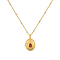 Lotus Pink Tourmaline Birthstone Locket Necklace - October displayed on a neutral background, showcasing the intricate design and faceted pink tourmaline gemstone, embodying spiritual jewelry, protection, and meaningful charm for meditation and self-discovery.