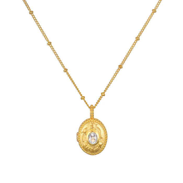 Lotus White Topaz Birthstone Locket Necklace - April, an elegant 18kt gold plated locket featuring a sparkling white topaz, symbolizing individuality and creativity. This spiritual jewelry piece serves as a meaningful talisman for meditation and manifestation, while incorporating the essence of the lotus flower for new beginnings, making it perfect for yoga enthusiasts and those seeking protection and connection to the zodiac.
