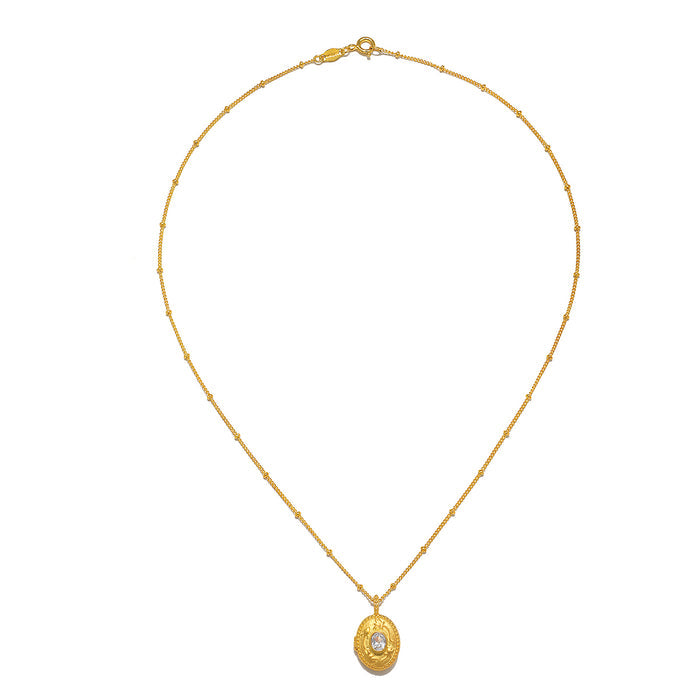 Lotus White Topaz Birthstone Locket Necklace - April displayed elegantly, emphasizing its craftsmanship and 18kt gold plating, ideal for meditation and as a talisman for zodiac enthusiasts.