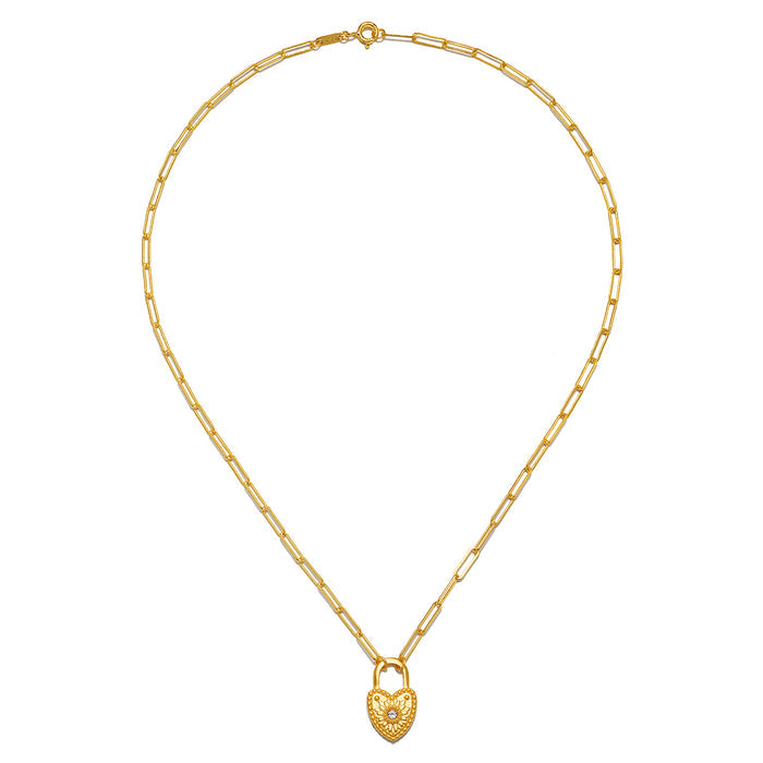 The Love Everlasting Padlock Heart Necklace displayed elegantly, showcasing its heart-shaped charm with white topaz on a delicate chain. This necklace embodies the essence of spiritual jewelry, making it a beautiful talisman for yoga and meditation.