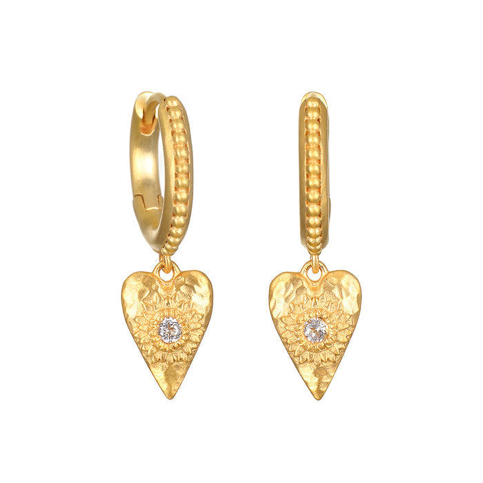 Loving Heart Huggie Earrings featuring a delicate heart design with a sparkling white topaz, symbolizing love and compassion, ideal for spiritual jewelry enthusiasts and a meaningful addition to meditation practice, manifestation rituals, and yoga sessions.