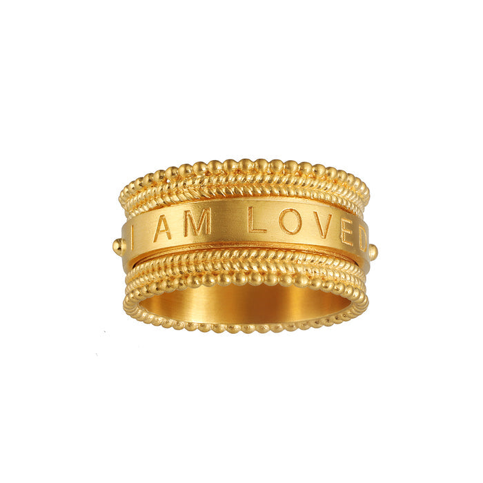Loving Mantra Spinning Ring featuring the engraving 'I AM LOVED', showcasing delicate beading, perfect for spiritual jewelry, meditation, and meaningful manifestation.