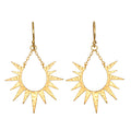 Lucent Glow Starburst Linear Drop Earrings, crafted in 18kt gold plated brass, embody spiritual jewelry that inspires meditation and meaningful manifestation, featuring a sunburst design that symbolizes guidance and dreams.