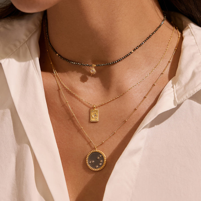 Close-up of the Magic in Moonlight Necklace being worn, highlighting the intricate design of the crescent moon and star, making it a beautiful talisman and piece of spiritual jewelry for meditation and personal transformation.