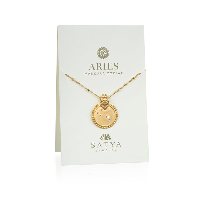 The Mandala Zodiac Aries White Topaz Necklace elegantly displayed on a branded card, emphasizing its role as a symbolic piece of jewelry. This beautiful amulet connects with the energy of the Aries zodiac, making it an ideal manifestation tool for those seeking inspiration in their spiritual practices.