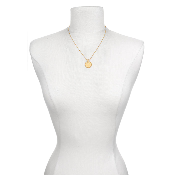 The Mandala Zodiac Aries White Topaz Necklace displayed on a form, highlighting its elegant design and significance as a spiritual amulet. This sacred piece combines beauty and meaning, making it an ideal gift for those in search of manifestation tools and zodiac-inspired jewelry.