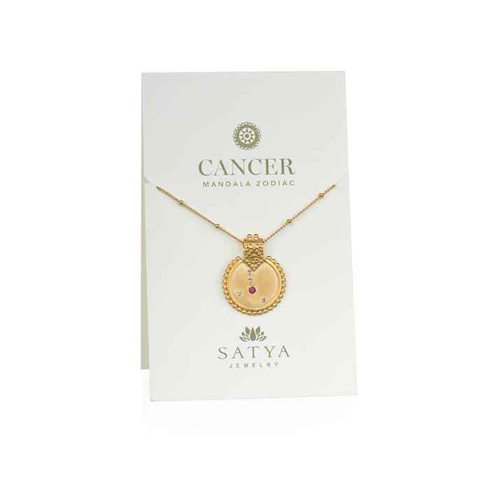 Mandala Zodiac Cancer Ruby Necklace displayed on elegant packaging, showcasing this unique spiritual jewelry piece. With its rich symbolism of the Cancer zodiac, this talisman promotes a deeper connection during meditation and serves as a protective charm. This necklace embodies a meaningful expression for yoga enthusiasts, representing the power of manifestation and spiritual growth.