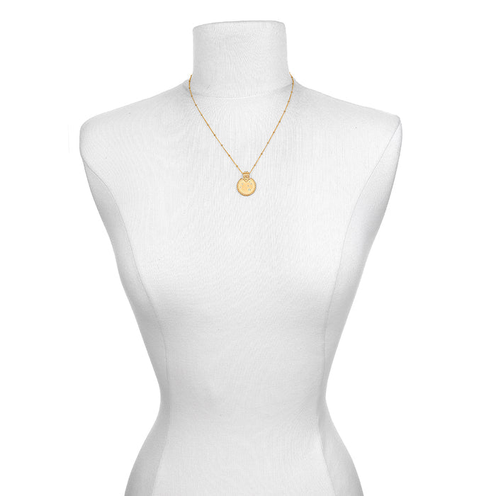 Mandala Zodiac Leo Peridot Necklace displayed on a mannequin, showcasing its design and connection to spiritual practices, yoga, and manifestation features related to the fire sign Leo.