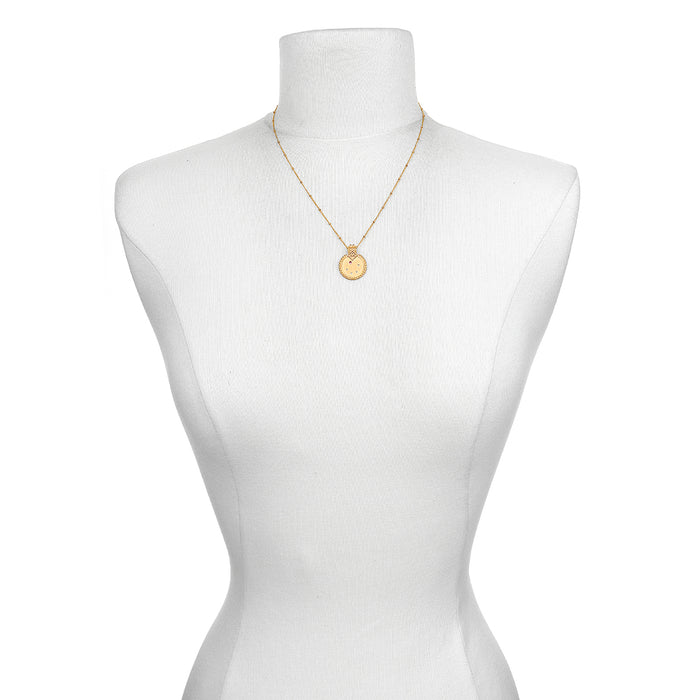 Mandala Zodiac Libra Pink Tourmaline Necklace showcased on a mannequin, representing a beautiful piece of spiritual jewelry that holds significance for yoga and meditation lovers.