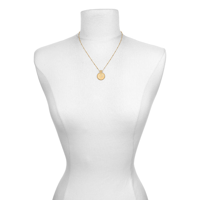 The Mandala Zodiac Pisces Aquamarine Necklace displayed on a mannequin, representing a meaningful accessory for those seeking spiritual connection through symbolic zodiac jewelry.