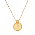 Mandala Zodiac Sagittarius Blue Topaz Necklace featuring a vibrant gold pendant, embodying spiritual jewelry that enhances meditation and serves as a talisman for protection and meaningful manifestation, ideal for yoga enthusiasts.