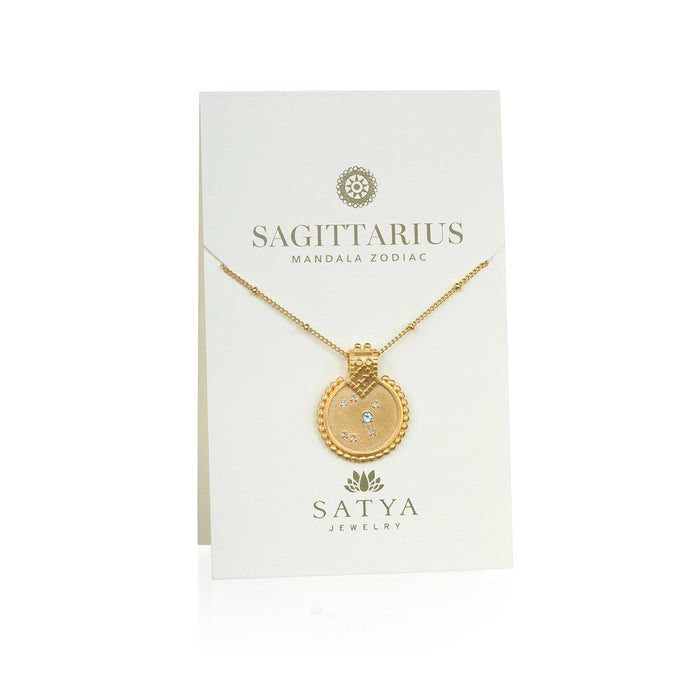 The Mandala Zodiac Sagittarius Blue Topaz Necklace elegantly presented on a display card, emphasizing its significance as spiritual jewelry for yoga and meditation, symbolizing protection and zodiac inspiration.