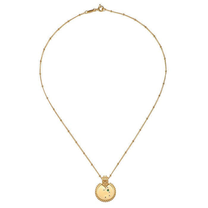 Mandala Zodiac Taurus Emerald Necklace showcasing its elegant design, perfect for spiritual jewelry and meditation gifts. This meaningful amulet symbolizes Taurus energy, embodying protective qualities for a vibrant yoga practice.