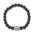 Men's Ganesha Hindu God Black Onyx Bracelet featuring matte black onyx beads and a sterling silver barrel bead accent, perfect for spiritual jewelry, meditation gifts, and meaningful mantras. This bracelet symbolizes protection and grounding energy, making it a significant amulet for yoga and manifestation practices.