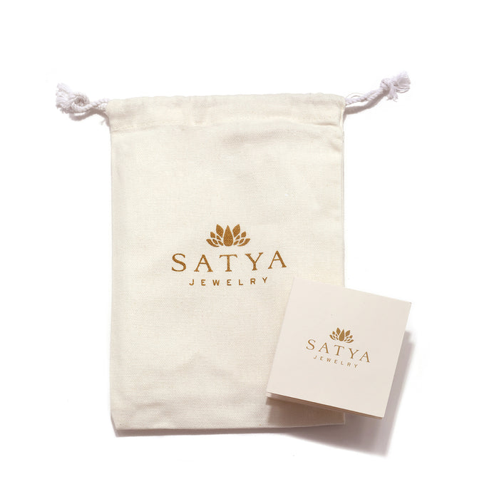 Mini Mandala Necklace presented in a beautifully branded Satya Jewelry pouch, reflecting its design for spiritual jewelry, meditation gifts, and meaningful symbolism. This enchanting piece serves as a protective amulet, symbolizing harmony and manifestation, perfect for yoga enthusiasts and those seeking a deeper connection to their sacred intentions.
