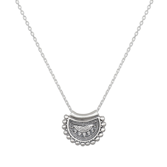 Mini Mandala Silver Necklace showcasing a beautifully crafted mandala pendant, symbolizing spiritual harmony and protection. Ideal for meditation and wearing as a talisman, this elegant jewelry piece reflects meaningful charm for manifestation, enhancing yoga practices and zodiac beliefs.