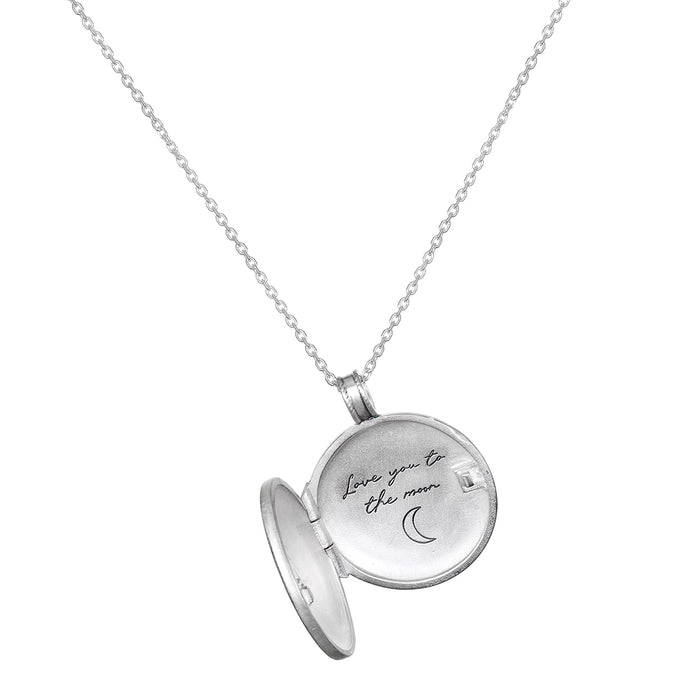 Inside view of the Mother Moon Silver Locket Necklace, revealing the heartfelt inscription 'love you to the moon', a beautiful reminder of meaningful connections and spiritual intentions perfect for charm and manifestation.