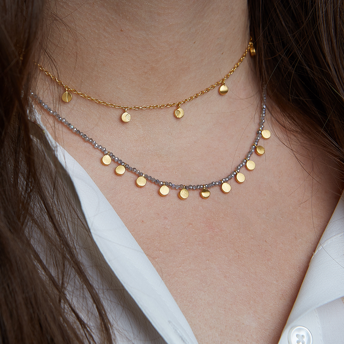 A stacked view of the Mystical Moonlight Necklace with another delicate necklace, perfect for spiritual jewelry enthusiasts. This showcases the connection to protection, meaning, and the phases of the moon in a fashionable way.