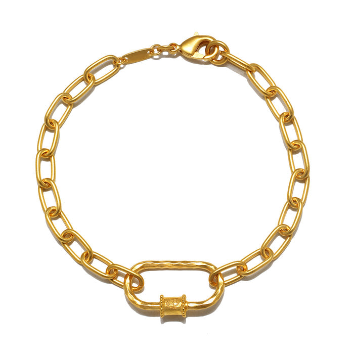 New Beginnings Lotus Charm Holder Bracelet in 18kt gold plate featuring a carabiner design for meaningful charms, perfect for spiritual jewelry and meditation, symbolizing transformation and renewal.