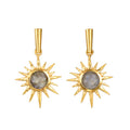 Pair of gold starburst earrings with labradorite stone centers and tapered bail tops.